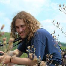 Nick Mischler’14 taking photographs in the mountains of Pennsylvania.